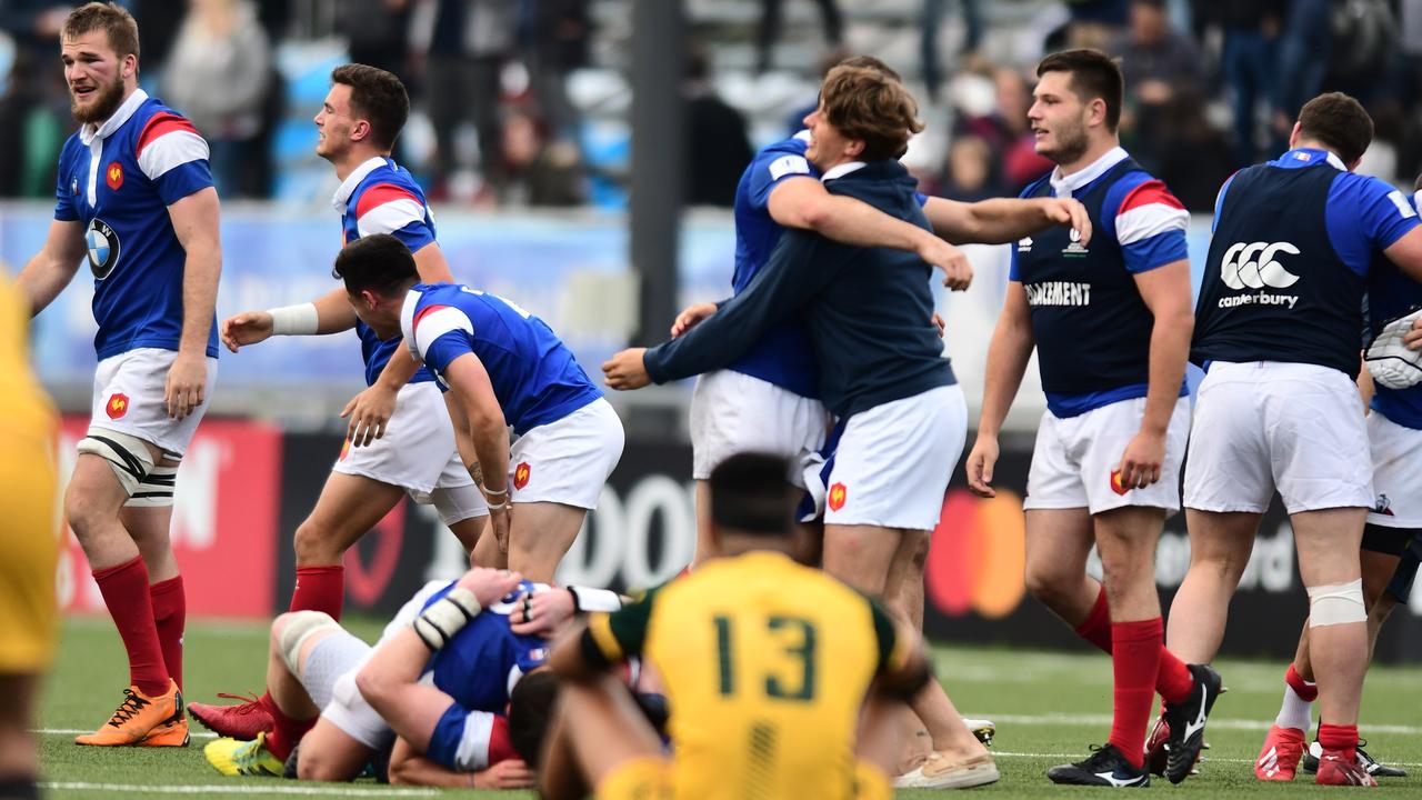 France celebrates at the end of the match.