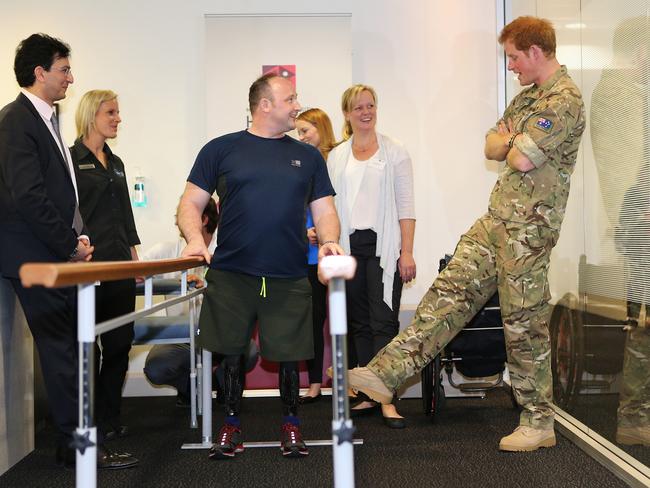 Prince Harry of Wales visits Lt Ali Spearing, a Royal Engineers Officer who lost both legs above the knees in Afghanistan, at Macquarie University Clinic.