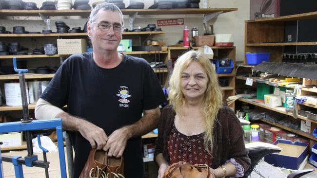 For 67 years Theo's Shoe Hospital has been the go-to for Cairns residents needing quality shoes, bags and luggage repairs. Cobblers Monica and Mick McLeod said they love to restore worn items to their former glory. Picture: Alison Paterson