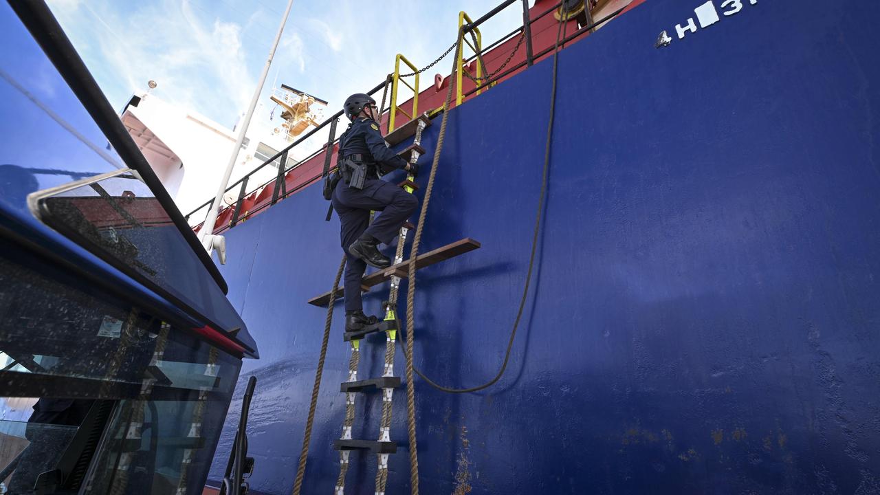 Australian Border Force Senior Border Force Officer Steve boards a ship for a search. Picture: Mark Brake