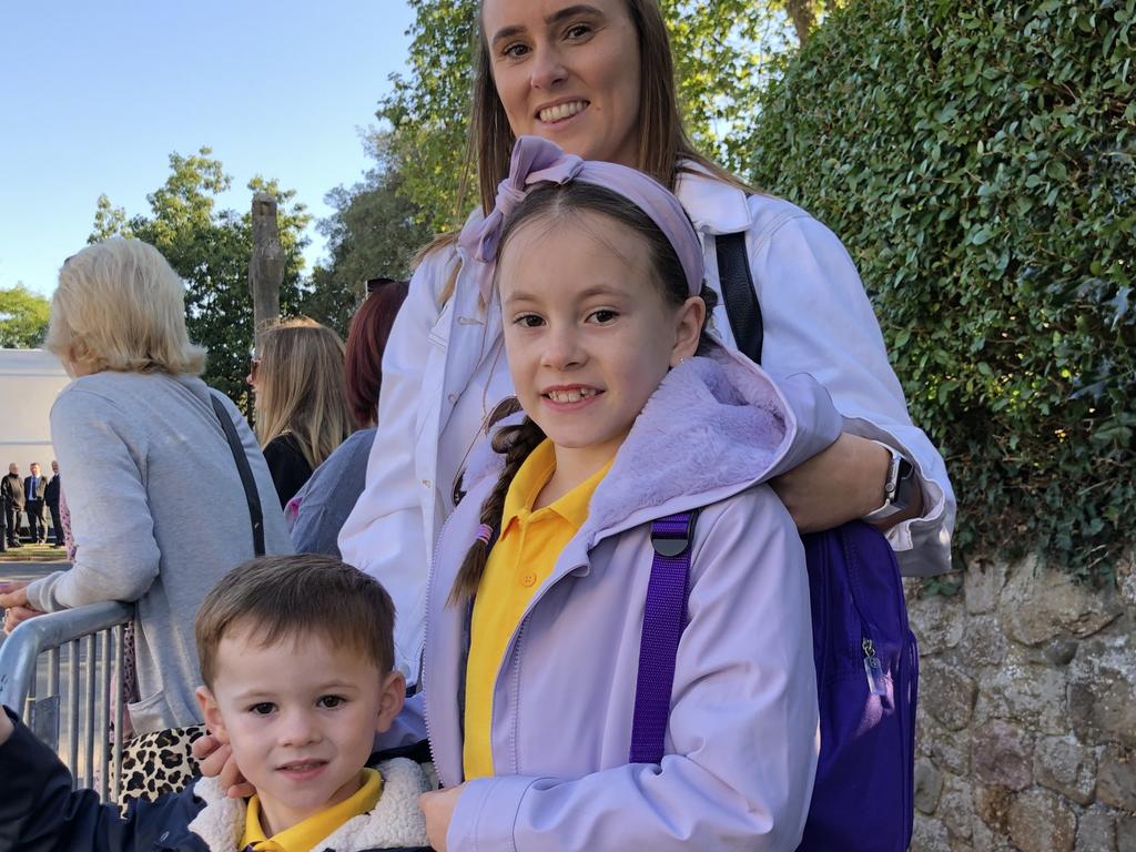 Jodie Powell with Halle, 8, and Alby, 4, waiting for King Charles, outside Llandaff Cathedral in Cardiff, Wales, on September 16, 2022. Picture: Stephen Drill.