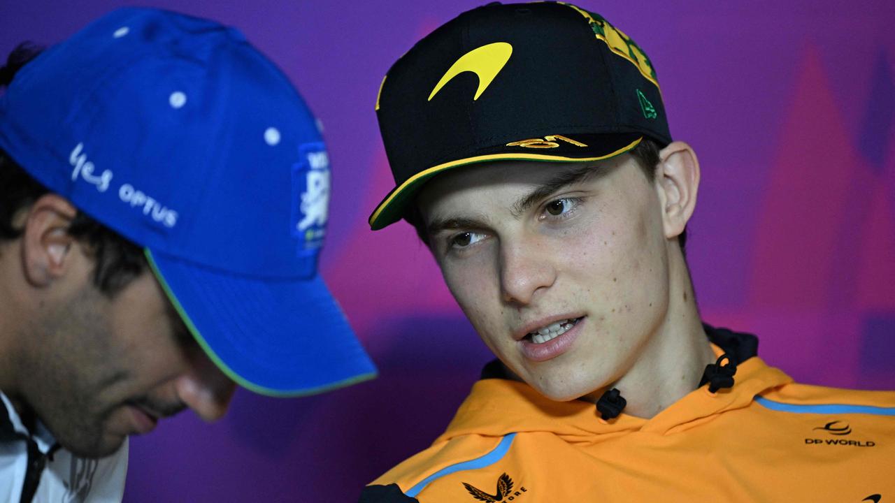 McLaren's Australian driver Oscar Piastri (R) talks to RB's Australian driver Daniel Ricciardo during a press conference ahead of the Formula One Australian Grand Prix in Melbourne on March 21, 2024. (Photo by Paul Crock / AFP) / -- IMAGE RESTRICTED TO EDITORIAL USE - STRICTLY NO COMMERCIAL USE --