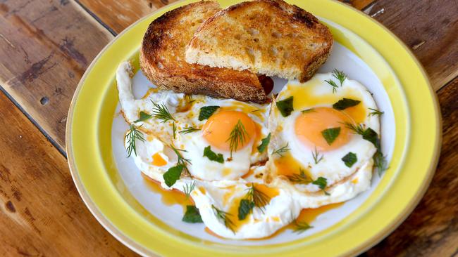 Turkish eggs at the Golden Times cafe. Picture: John Gass