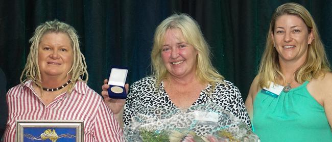 Representatives from Running Wild accept the Community Organisation Award. Picture: Redland City Council.