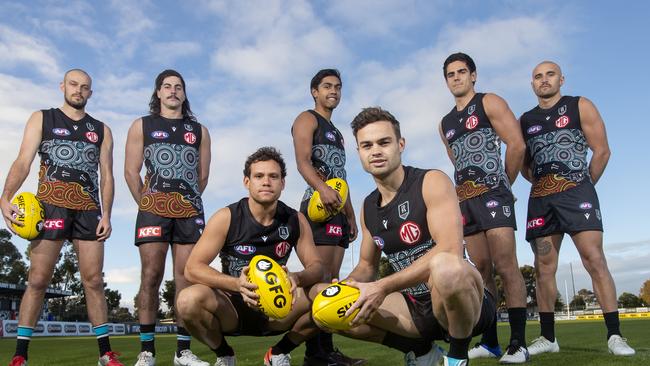 Port Adelaide Indigenous players Jarrod Lienert, Lachie Jones, Steven Motlop, Trent Burgoyne, Karl Amon, Joel Garner and Sam Powell-Pepper wearing their new jumper at Alberton Oval. Picture Simon Cross