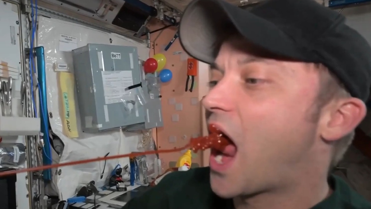 Astronaut posts clip of himself squirting sauce in his mouth while in space