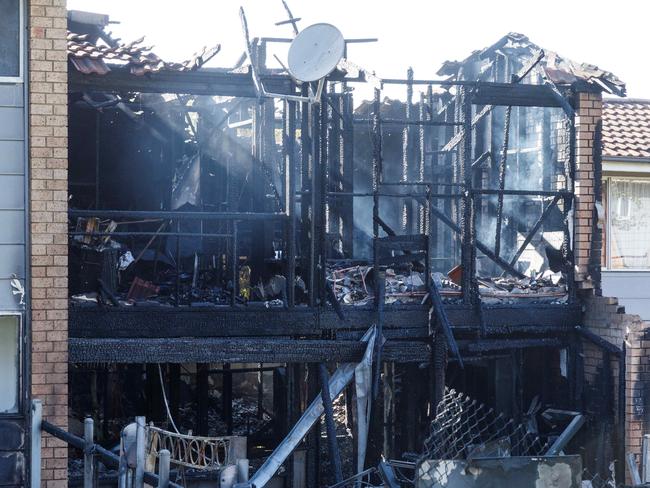 WEEKEND TELEGRAPHS. CHECK WITH PIC EDITOR JEFF DARMANIN BEFORE USE. A housing commission unit in Claymore burnt down around 2am this morning. Pic shows . Friday 15/12/2023. Picture by Max Mason-Hubers