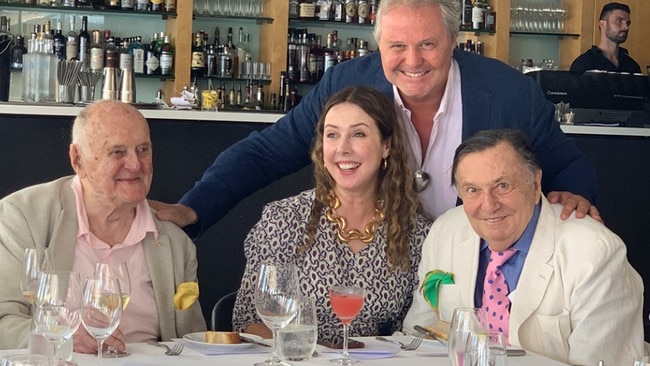 John Olsen (left) with his children and friend Barry Humphries (right) in 2019. Picture: Supplied