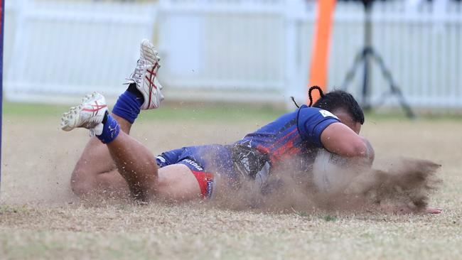 Kolin Saukuru dives over for Campbelltown Collegians, reserve grade. Picture: Steve Montgomery