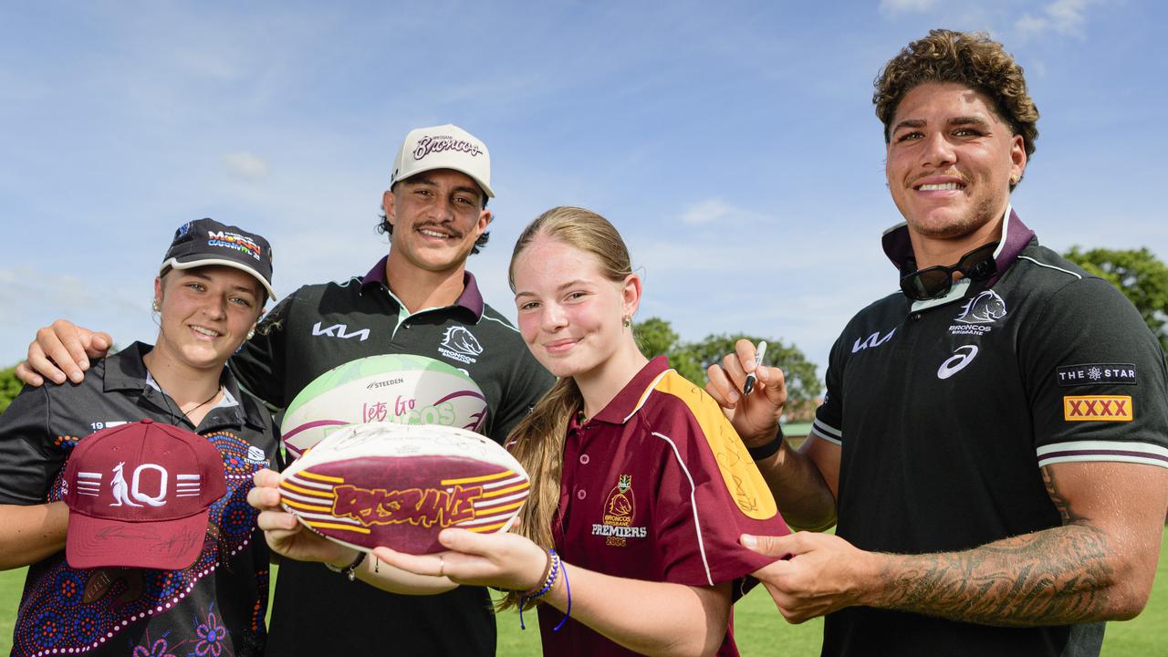 Holly Mead (left) and Kayla Munt with Broncos players Kotoni Staggs and Reece Walsh at a community youth development day ahead of the Broncos trial game in Toowoomba, Friday, February 14, 2025. Picture: Kevin Farmer