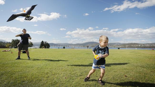 Sylvain Holmes, 4, is making use of the wind to fly her kite at the Cenotaph. Picture: MATHEW FARRELL