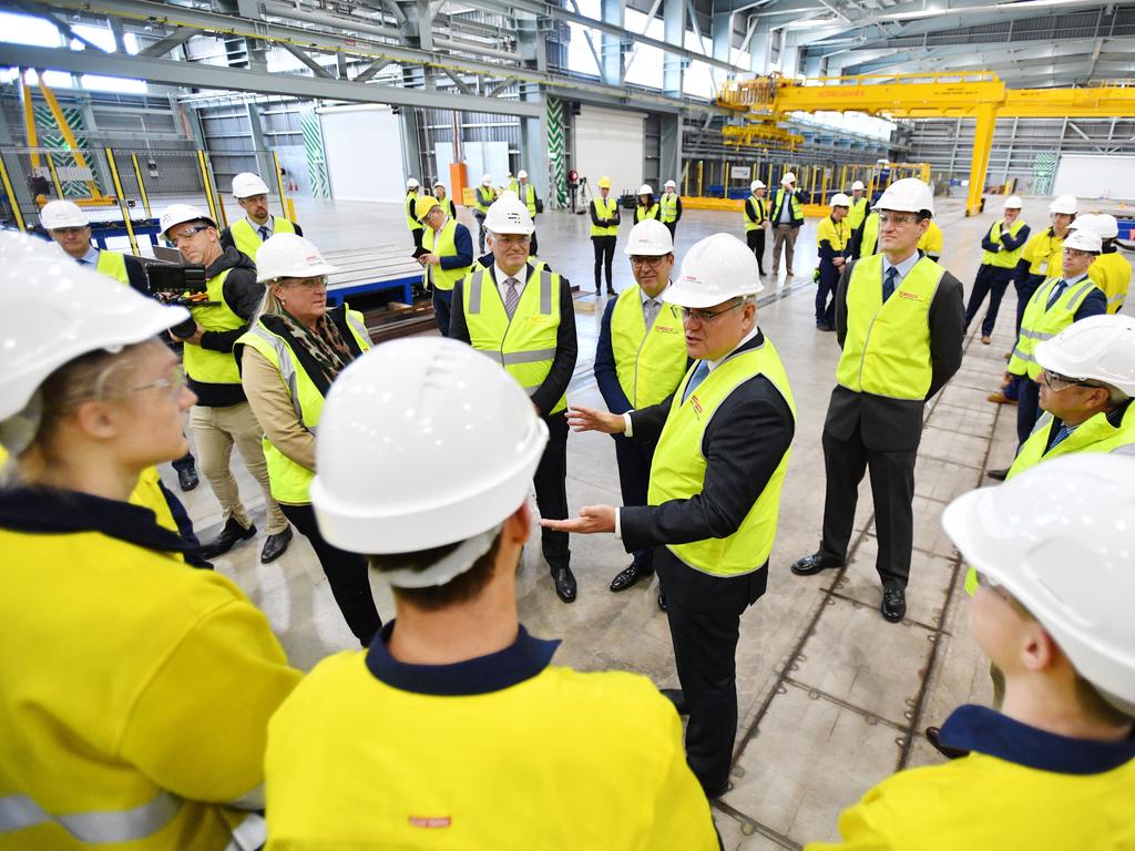 Prime Minister Scott Morrison greets workers during a tour of the Osborne Naval Shipyards in Adelaide. Picture: NCA NewsWire / David Mariuz.