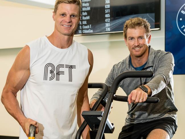 Former AFL player Nick Riewoldt with former cricketer George Bailey at the opening of Body Fit Training studio in Hobart. Picture: Alastair Bett