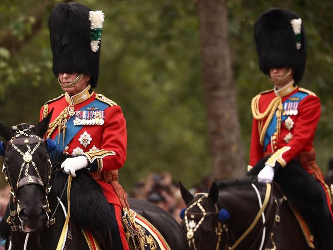 Britain's King Charles III and Britain's Prince William, Prince of Wales ride their horses as they parade down The Mall after leaving Buckingham Palace during the King's Birthday Parade. Picture: Hentry Nicholls / AFP