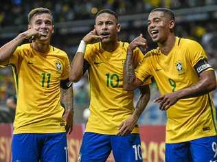 SAMBA STYLE: Brazil's Philippe Coutinho (left), Neymar and Gabriel Jesus celebrate a goal against Argentina during the qualification stages for 2018 FIFA World Cup in Russia. No South American team has won a World Cup on European soil - can Brazil be the first? Picture: Pedro Vilela