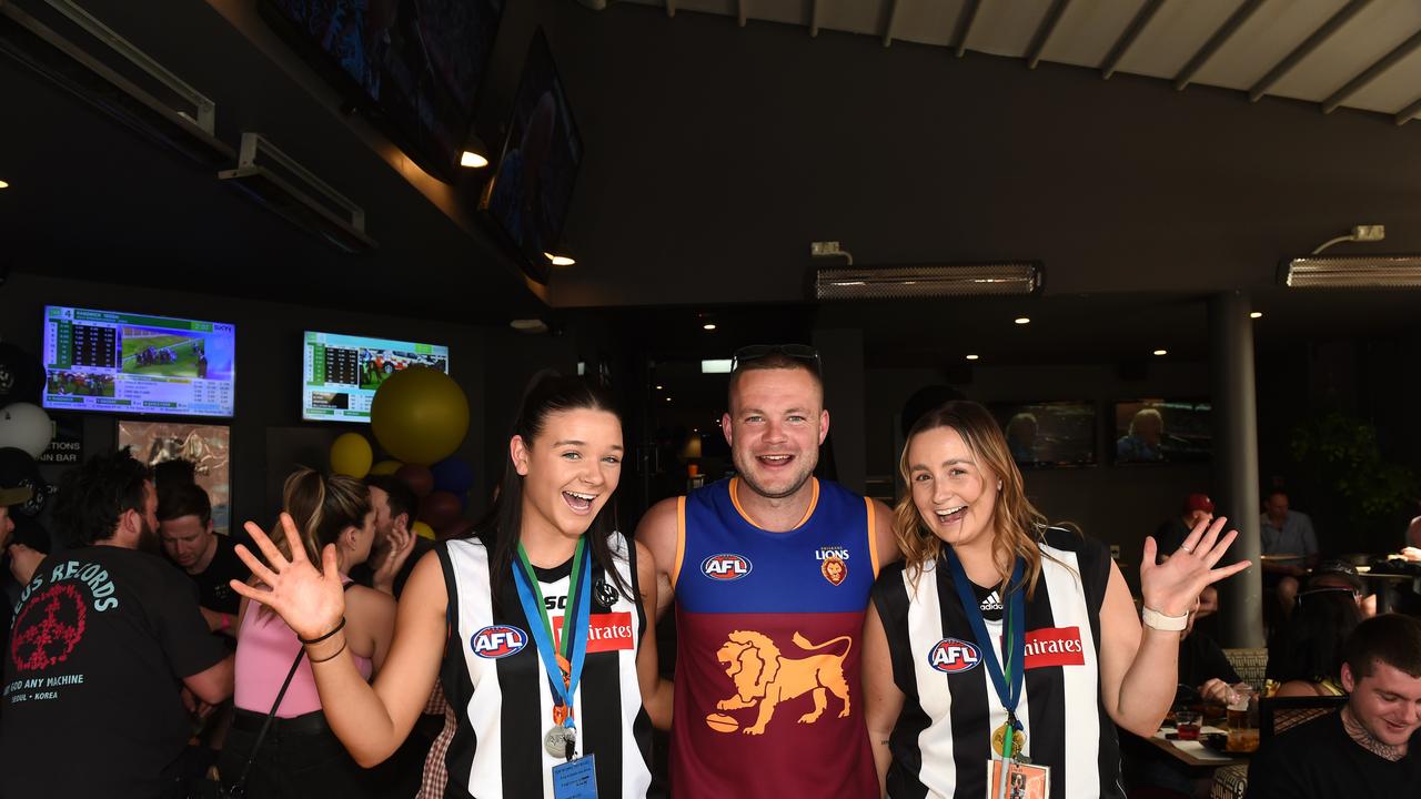 Page Barry, Matt Ludbrook and Olivia Hall. AFL GF in Geelong.