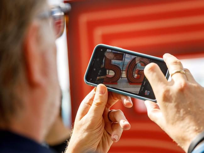 The 5G logo is pictured on a during the launch of Vodafone UK's 5G mobile data network in London on July 3, 2019. (Photo by Tolga Akmen / AFP)