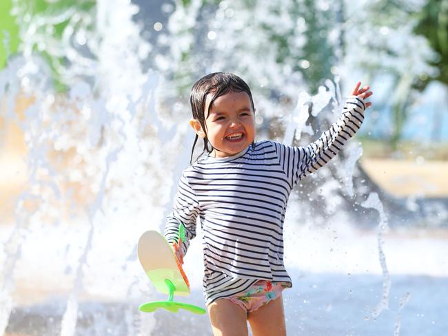 Three-year-old Elsie Allen from Ashmore playing at Broadwater Parklands. Photo: Jason O’Brien 