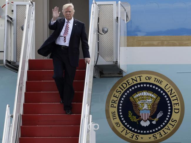 Mr Trump, pictured at the Philadelphia International Airport before speaking at the Republican Congressional retreat, says he has a lot of work ahead of him. Picture: Matt Slocum/AP