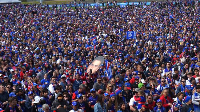 Bulldogs supporters flock to Whitten Oval for the players’ reception after the 2016 grand final. Picture: AAP