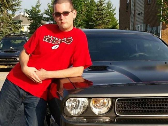 James Field poses with the Dodge Challenger he apparently used in the attack. Picture: Facebook