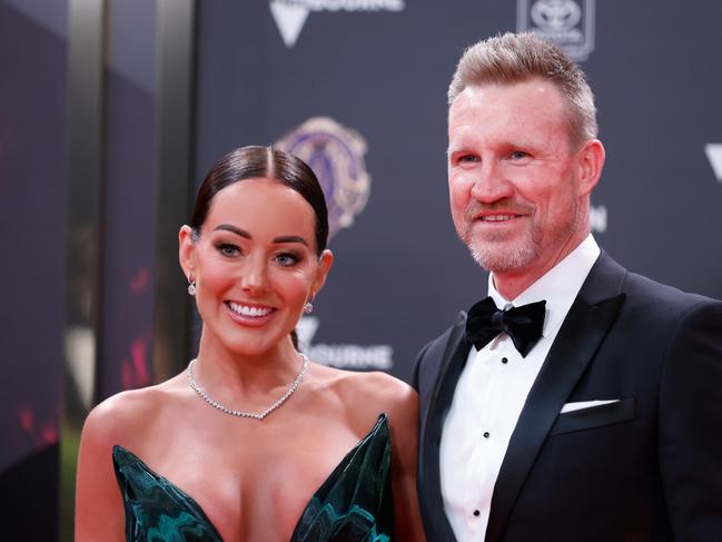 Nathan Buckley, picture with girlfriend Brodie Ryan, is making the switch from SEN breakfast to SEN mornings. Picture: Getty Images