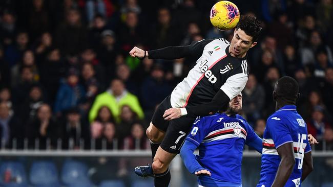 Cristiano Ronaldo hangs in the air to score a header against Sampdoria.