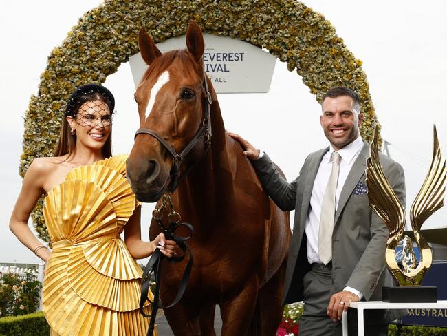 DAILY TELEGRAPH OCTOBER 23, 2024. Embargoed for Saturday 2nd November. Face of Golden Eagle Day James Tedesco and Friend of Golden Eagle Day Erin Holland with Gerry the horse and the Golden Eagle Trophy at Rosehill Gardens. Picture: Jonathan Ng