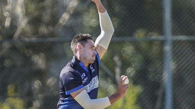 Nick Boland bowling for Prahran. Picture; Valeriu Campan