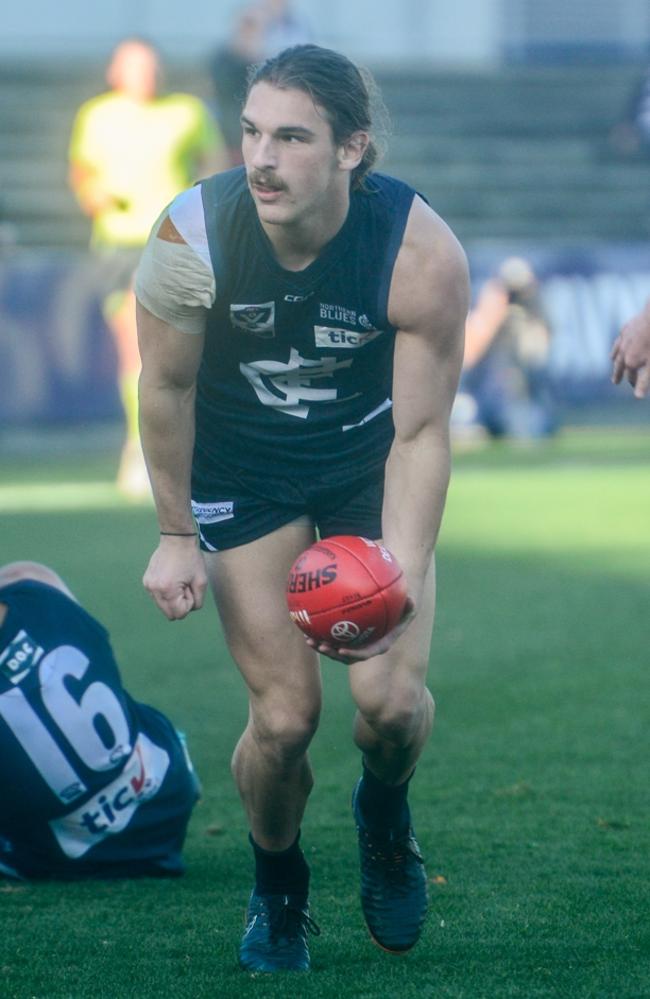 Jesse Palmer gets a handball away during a VFL game against Geelong. Picture: Amy Paton.