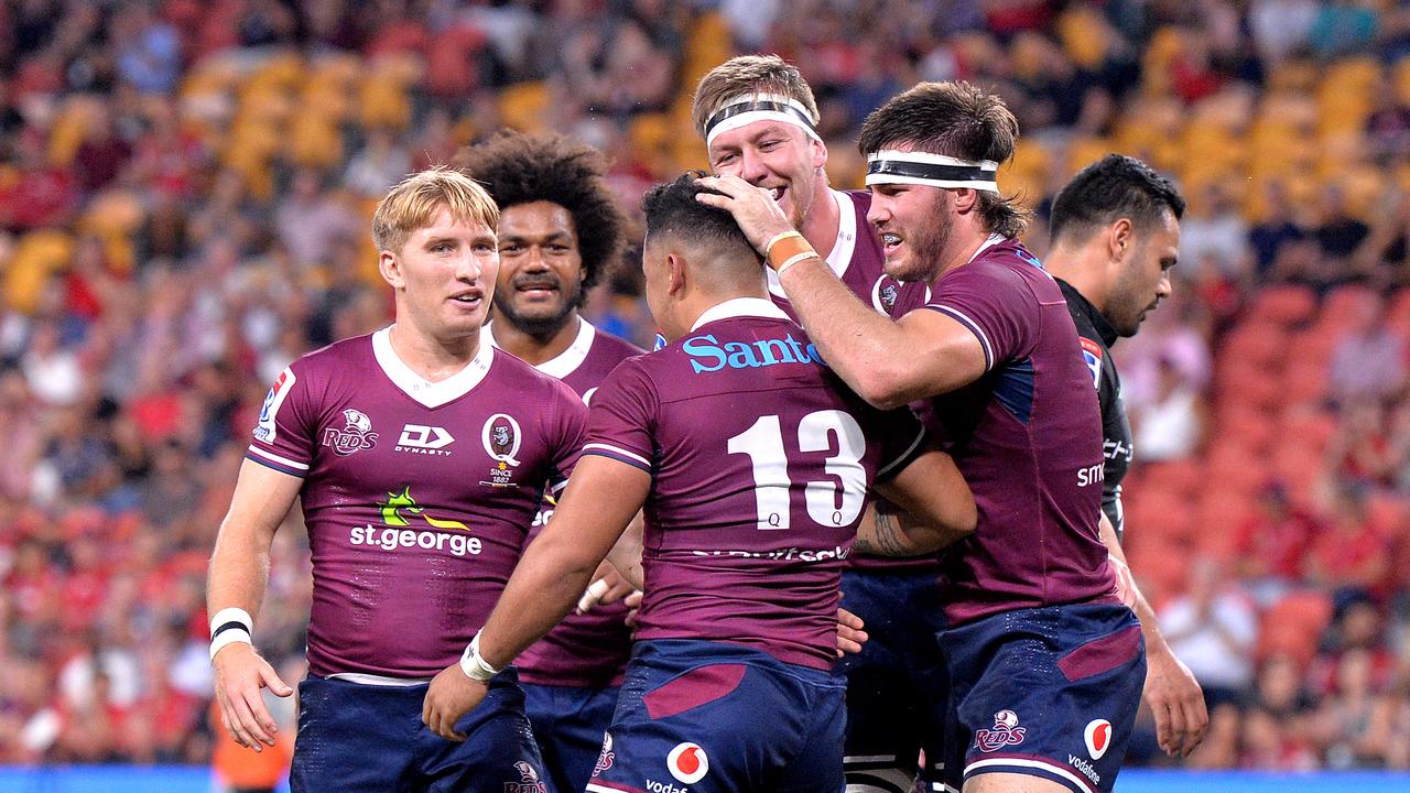 Hunter Paisami celebrates his first try in Super Rugby.