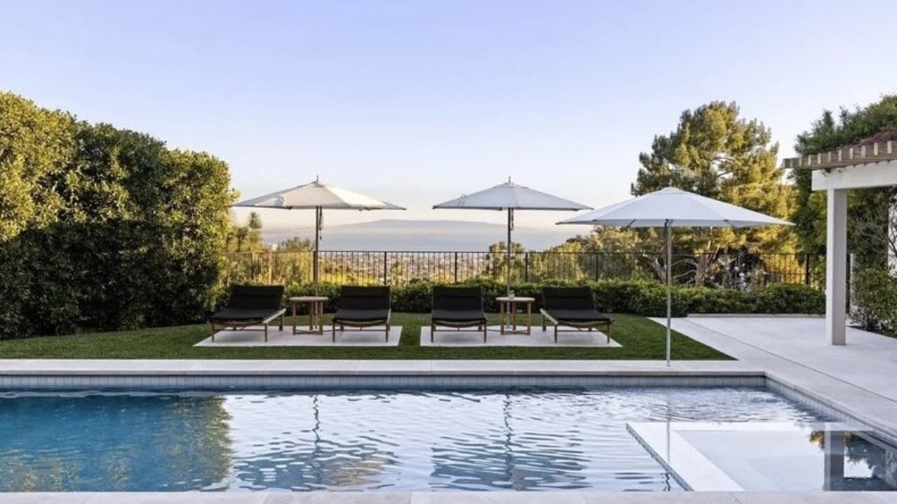 The outdoor pool offers stunning views of the Los Angeles area. Picture: Realtor