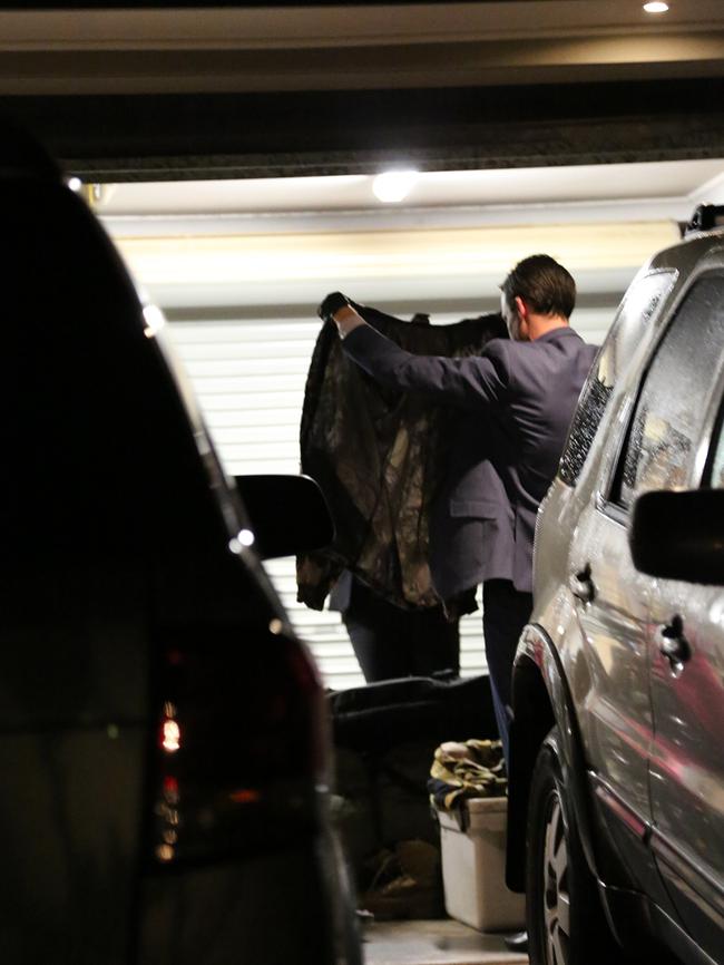 Detectives uncovered a camouflage suit during the search.