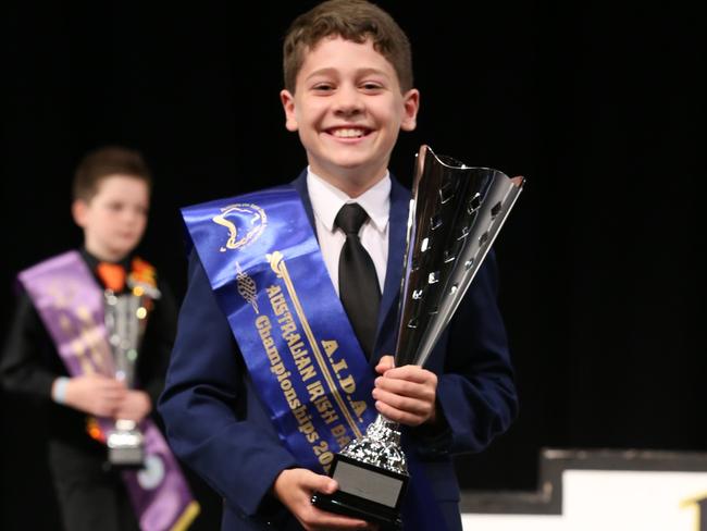 Phoenix Cooper with his national cup and trophy.