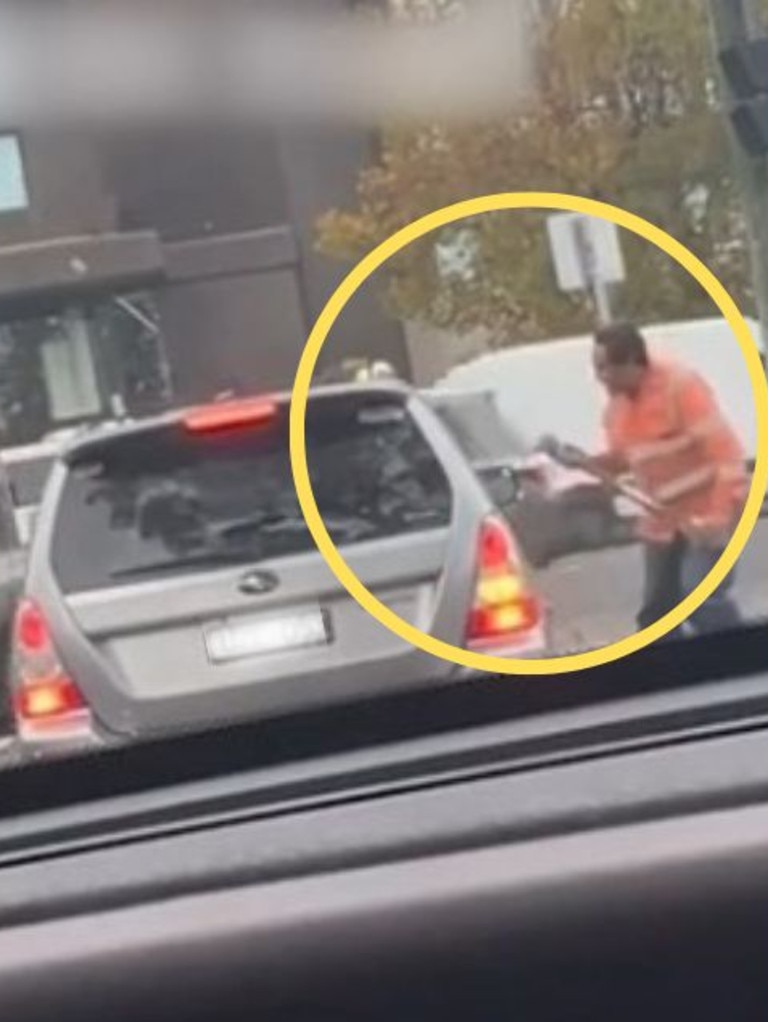 The footage captured an angry man tapping a pickaxe on a car window.