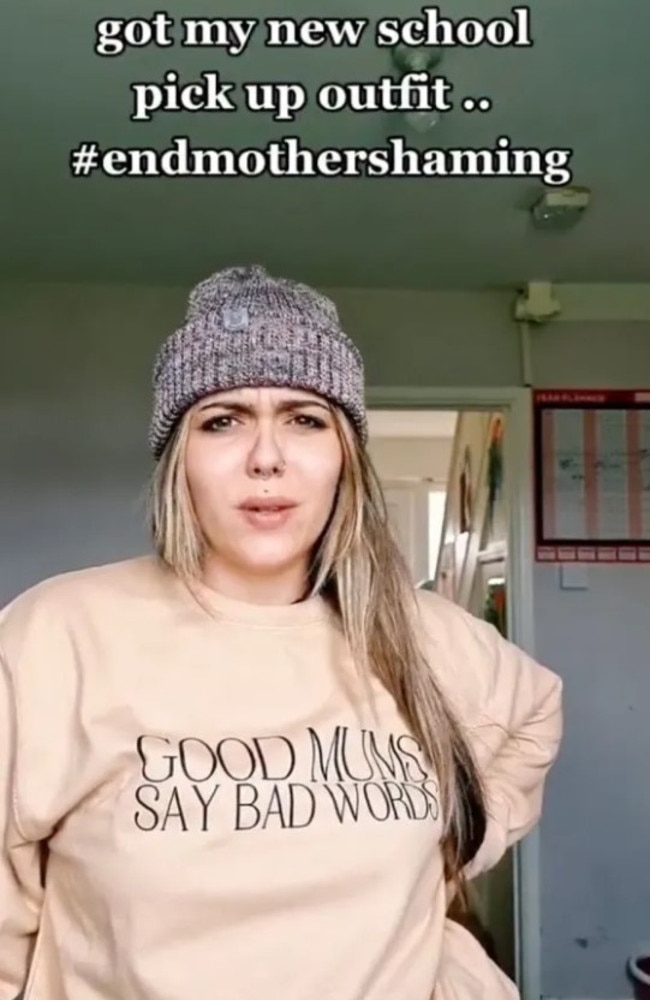 Her sweater proudly proclaimed that ‘good mums say bad words,’ proving she didn’t care what other parents thought. Picture: TikTok/s***_mums_club