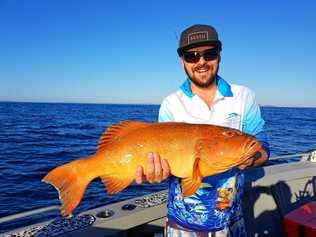 TOP TROUT: Stu Norris with a solid coral trout caught while out with Trent Hall. Picture: Contributed