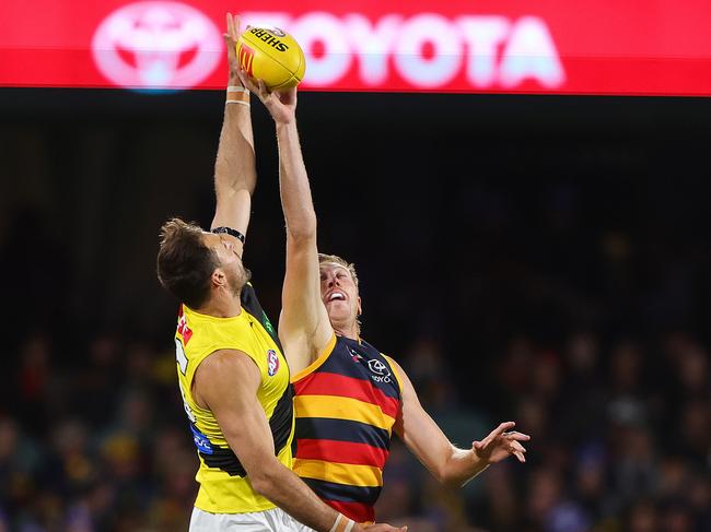 Kieran Strachan and Toby Nankervis fight for a tap. (Photo by Sarah Reed/AFL Photos via Getty Images)