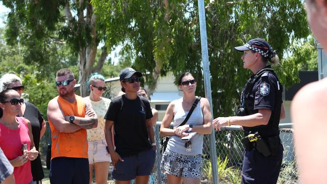 Scenes outside Helensvale Primary School after it went into lockdown. Photograph: Jason O'Brien