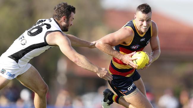 Brodie Smith escapes the clutches of Port Adelaide’s Sam Gray. Picture: Sarah Reed