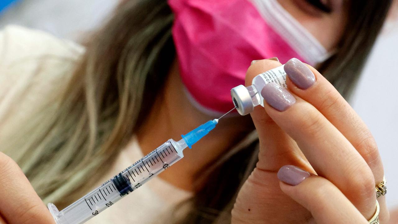 An Israeli health worker administers a dose of the Pfizer-BioNtech COVID-19 vaccine at Clalit Health Services in the central Israeli city of Hod Hasharon, on February 4, 2021. Picture: JACK GUEZ / AFP.