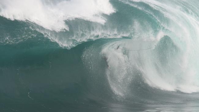 Australian big wave surfer Dylan Longbottom and the wipeout at a remote South Australian reef break that put him in hospital. Picture: Andrew Brooks