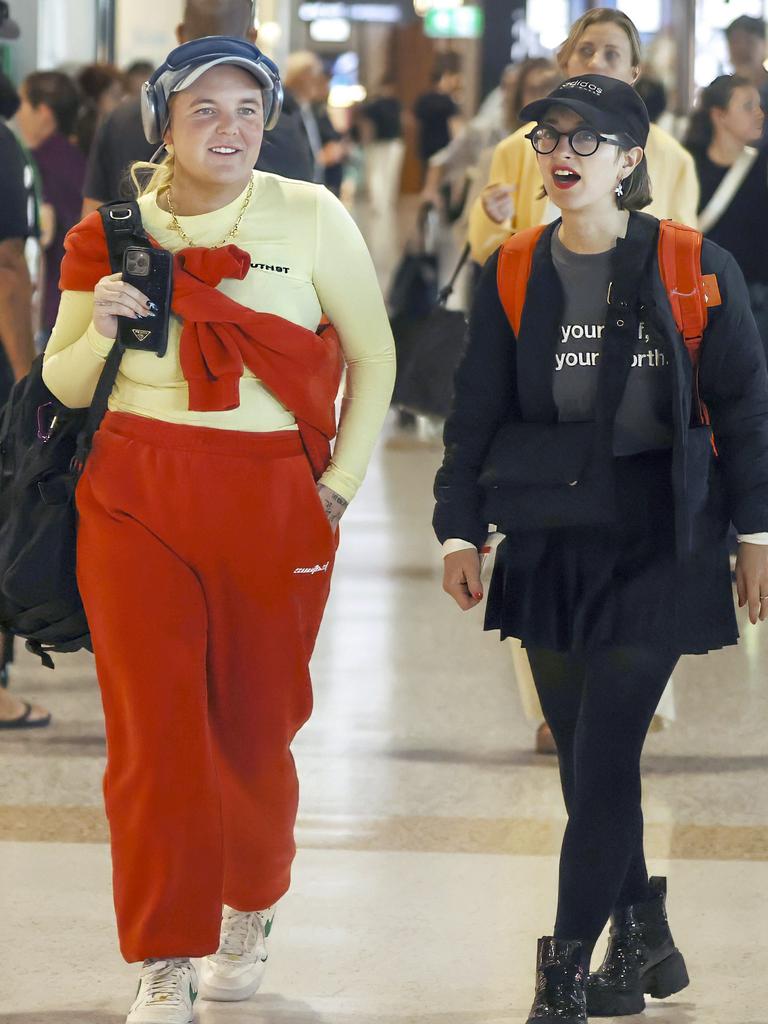 Jetsetter: Tones and a friend at Brisbane airport. Picture: MEDIA-MODE.COM