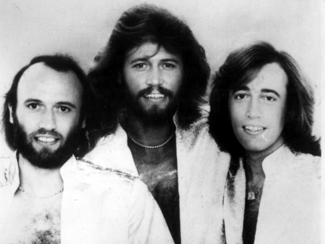 Brothers & singers in band "Bee Gees" (L-R) Maurice, Barry & Robin Gibb in 1980. Pic/Handout /Bee/Gees/Band headshot music singers groups bands multiple births twins