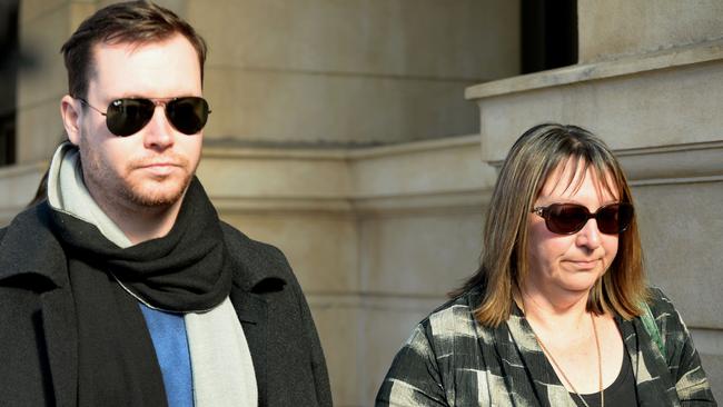 Dwyer's mother Tonya Dwyer leaves the Supreme Court last month with a supporter. Picture: Greg Higgs