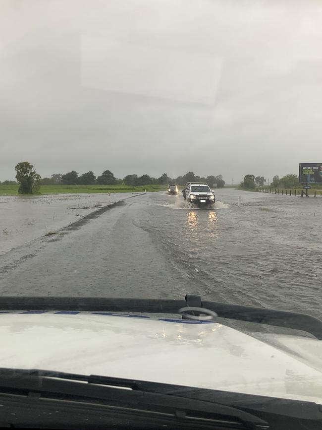 Drivers were stranded on the Bruce Highway as floodwaters rose at Goorganga Plains. Picture: Queensland Police