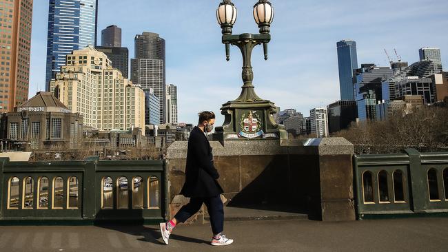 Masks are mandatory as Melbourne endures another extended lockdown. Picture: NCA NewsWire/Ian Currie