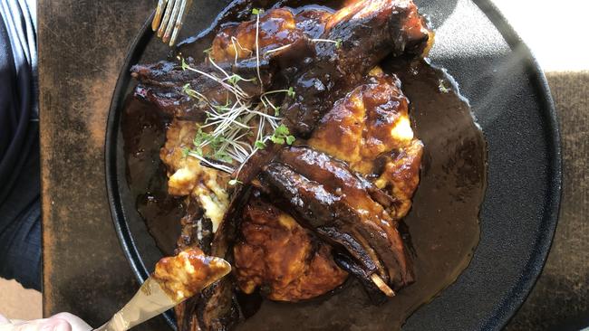 Heartlands Larder's honey bourbon lamb ribs with mash. Picture: Alix Davis