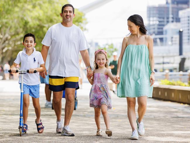 Cherie and Brendan Philip-Kingsley of Toowong at Southbank with children Estella, 5, and Nico, 10. Picture: Lachie Millard