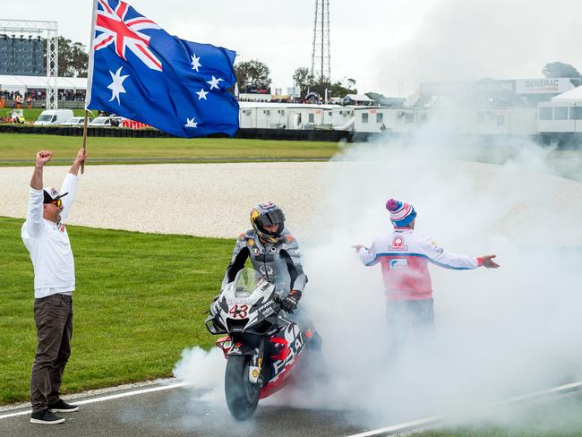 A burnout marks Jack Miller’s third-place finish. Picture: Jake Nowakowski